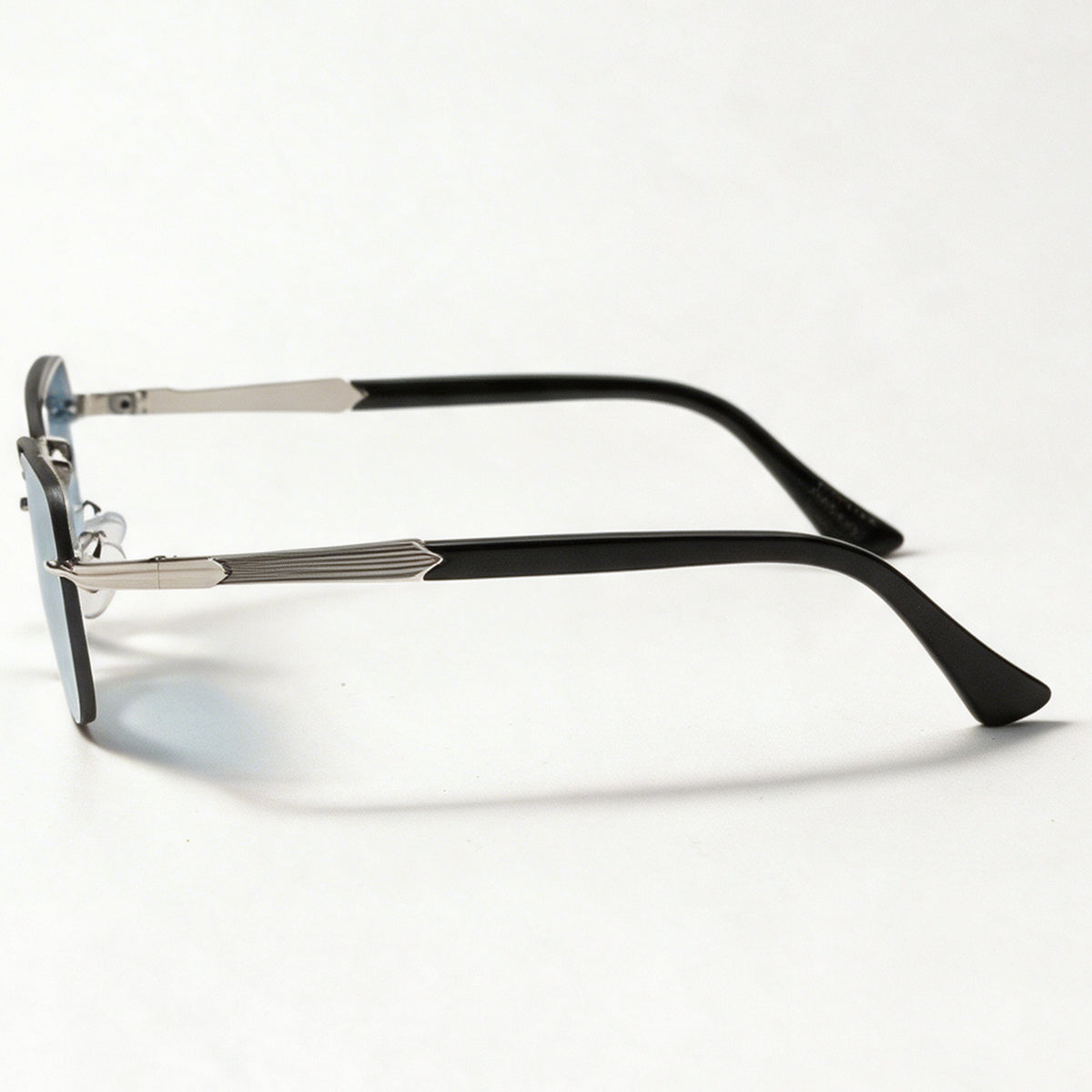 The Skipper semi-rimless rectangle sunglasses side profile showing temple and hinge — view 3