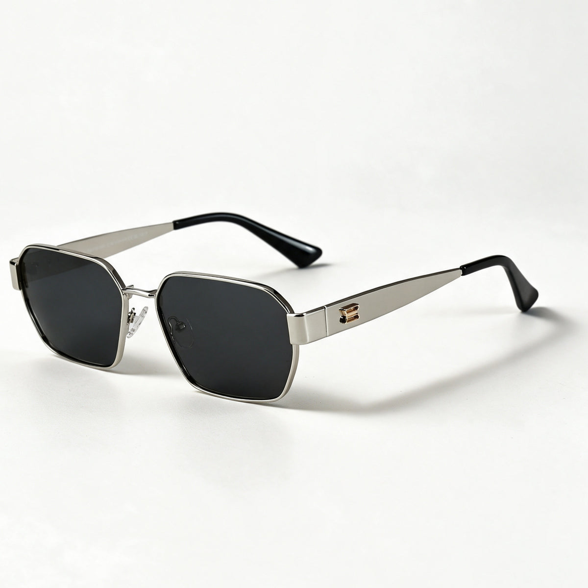 The Banker silver wide hexagonal navigator sunglasses three quarter view showing temple and hinge — view 3