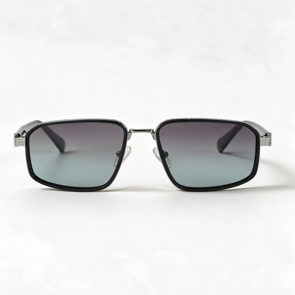 The Broker metal navigator sunglasses front view in light gun with engraved temples — view 2