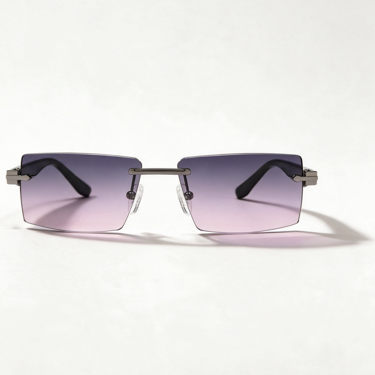 The Ambassador rimless rectangle sunglasses front view in gun metal with grey pink mirror lenses — view 2