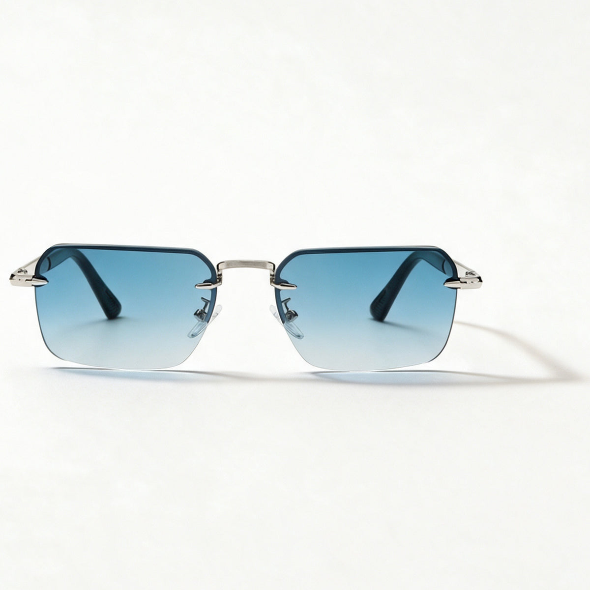 The Skipper semi-rimless rectangle sunglasses front view in silver with gradual blue lenses — view 2