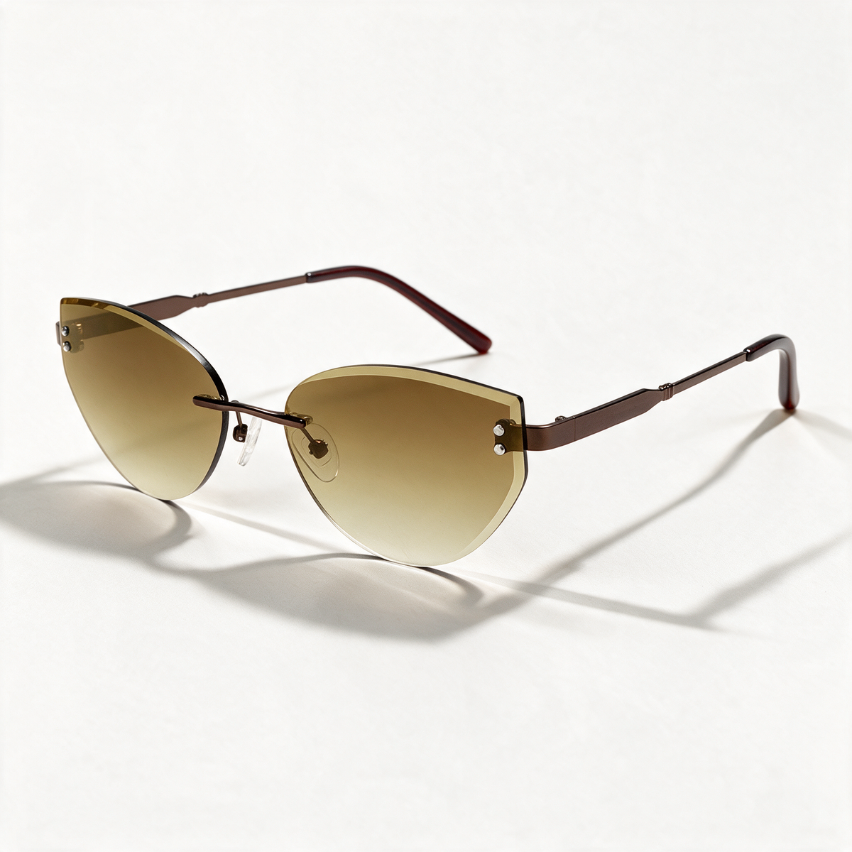 The Blank Tag Ingenue rimless cat-eye sunglasses for women, coffee with brown gradient lens – front view — view 1