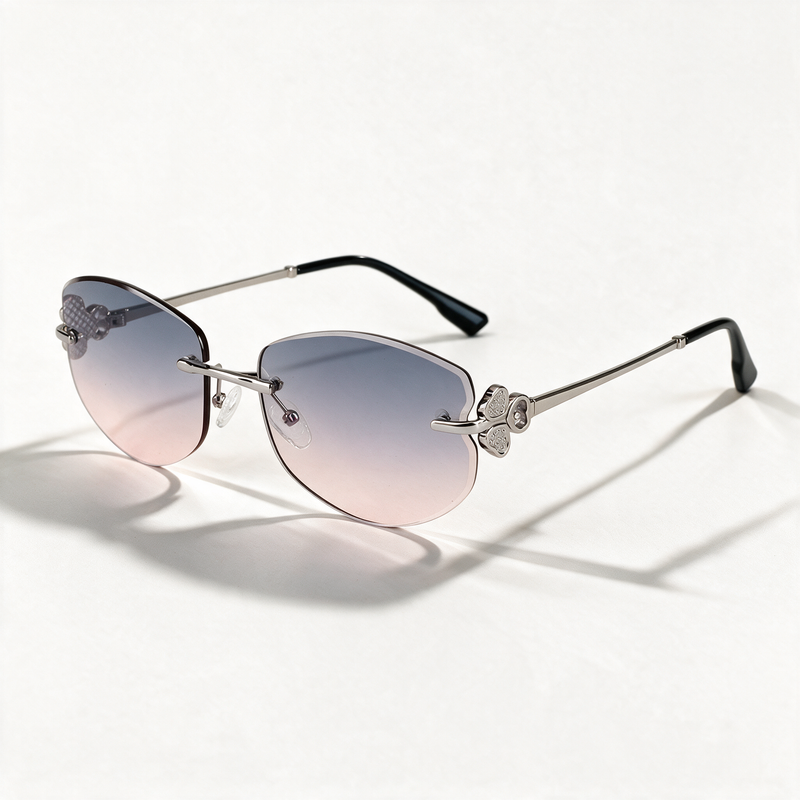 The Blank Tag Mermaid rimless oval sunglasses for women, gun metal with purple-pink gradient lens – front view — view 1