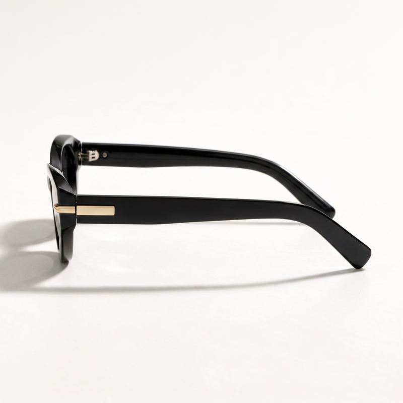The Blank Tag Charmer black polarised cat-eye sunglasses for women with slim gold temple bar – angled view — view 2