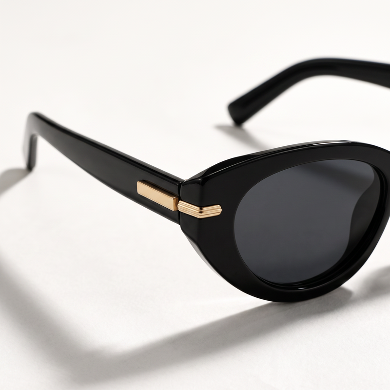 The Blank Tag Charmer black polarised cat-eye sunglasses for women with slim gold temple bar – detail view — view 3