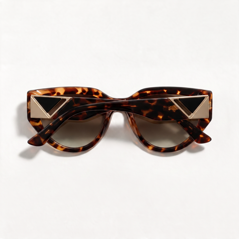 The Blank Tag Vixen demi tortoise polarised cat-eye sunglasses for women with gold temple accent – angled view — view 3