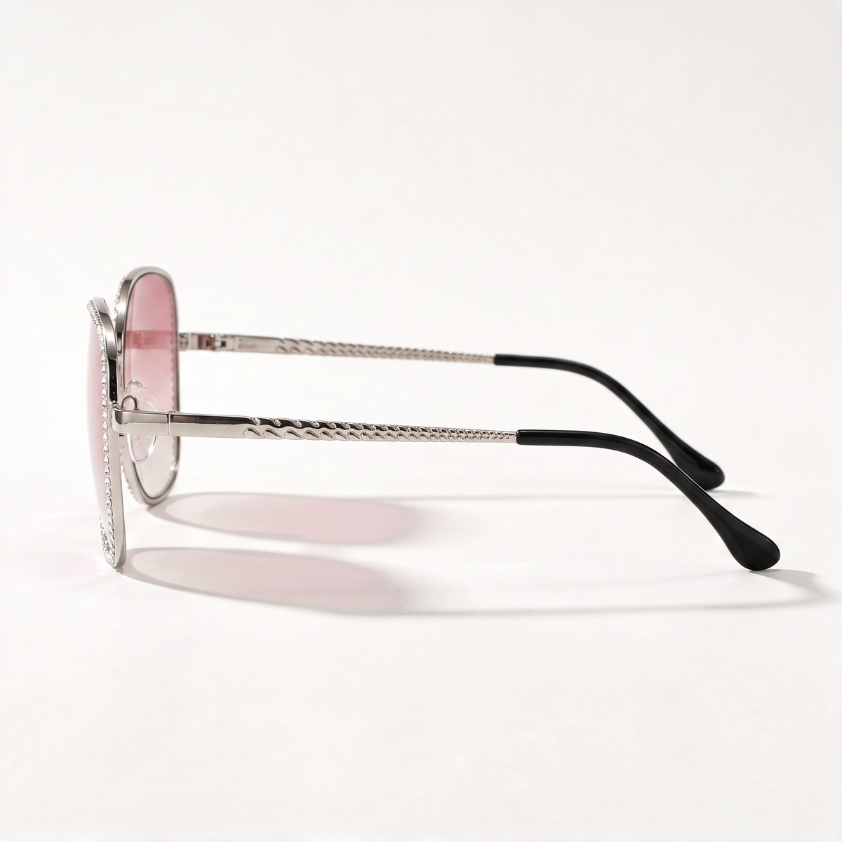 The Blank Tag Starlet crystal-trim oversized square polarised sunglasses for women, silver with pink gradient lens – angled view — view 3