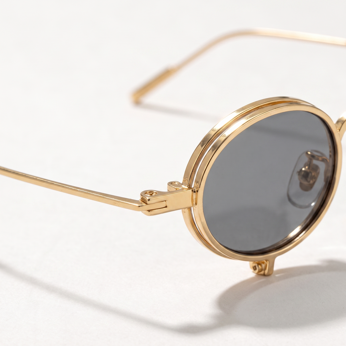 The Blank Tag Relic vintage micro round polarised sunglasses, gold with grey tinted lens – side view — view 2