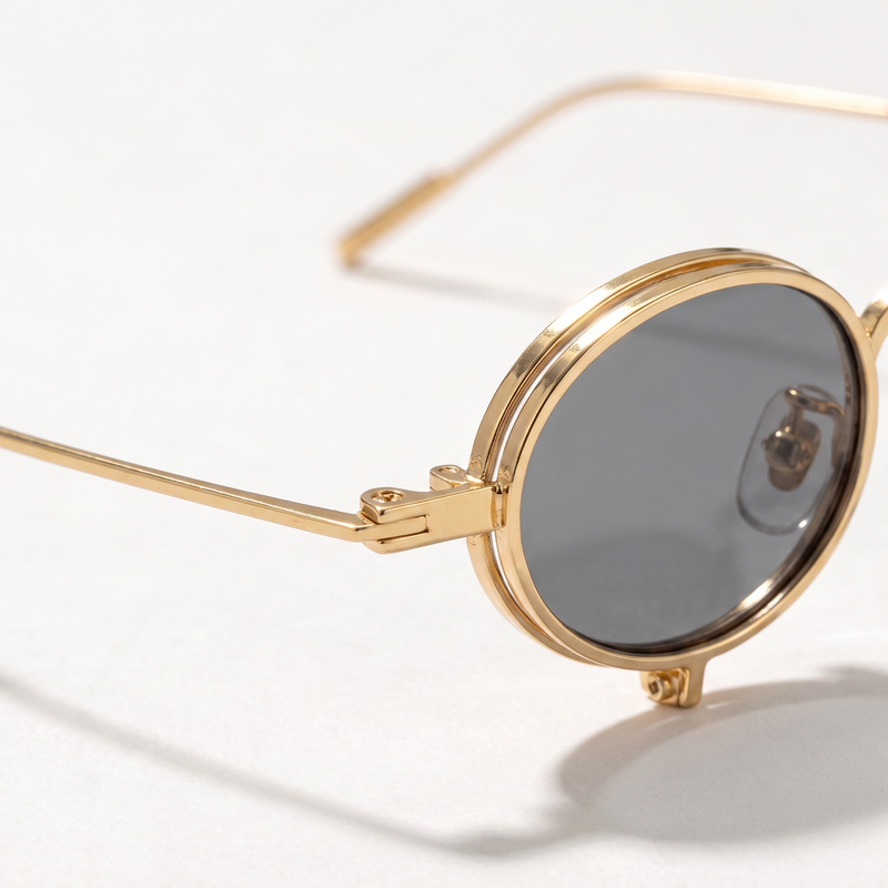 The Blank Tag Relic vintage micro round polarised sunglasses, gold with grey tinted lens – side view — view 2