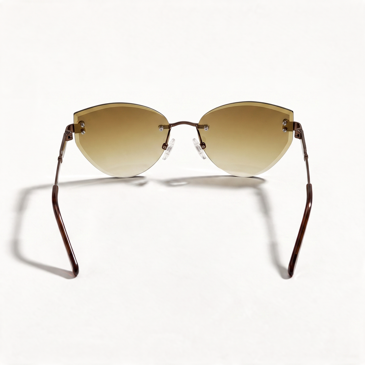 The Blank Tag Ingenue rimless cat-eye sunglasses for women, coffee with brown gradient lens – side view — view 2