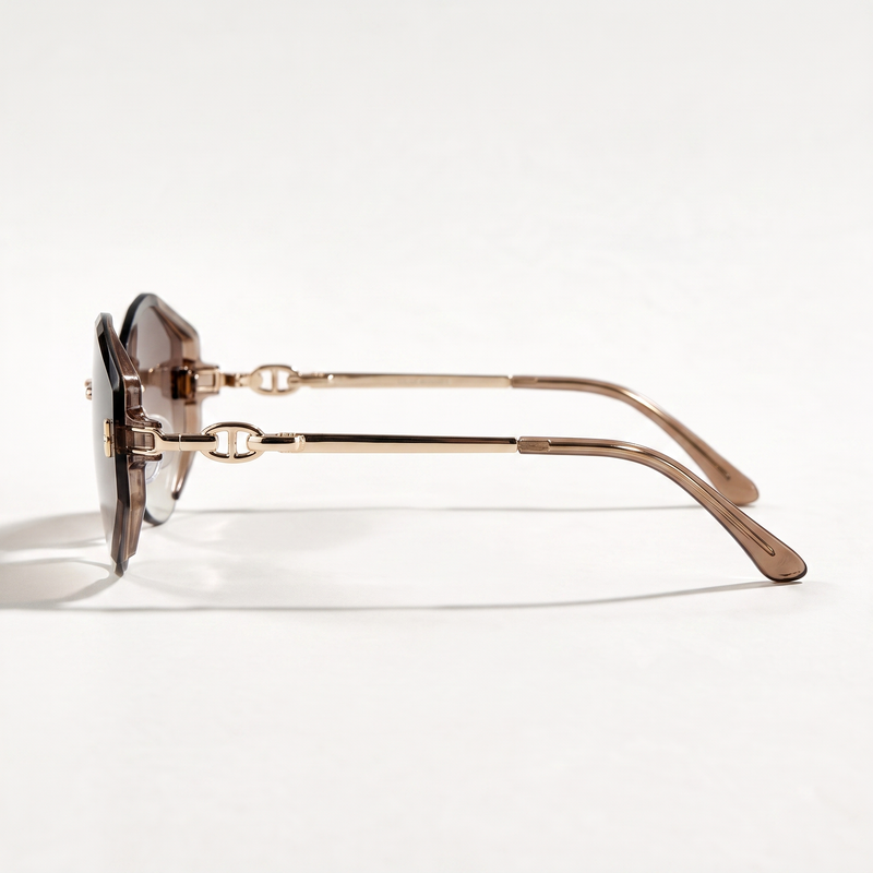 The Blank Tag Prism rimless geometric octagon sunglasses for women, gold with faceted brown gradient lens – angled view — view 3