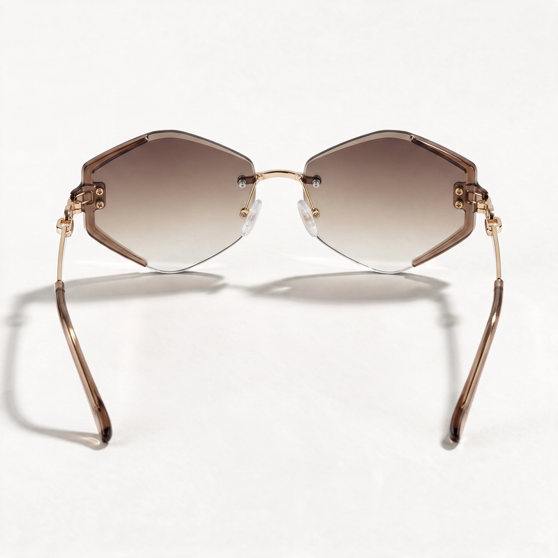 The Blank Tag Prism rimless geometric octagon sunglasses for women, gold with faceted brown gradient lens – detail view — view 4