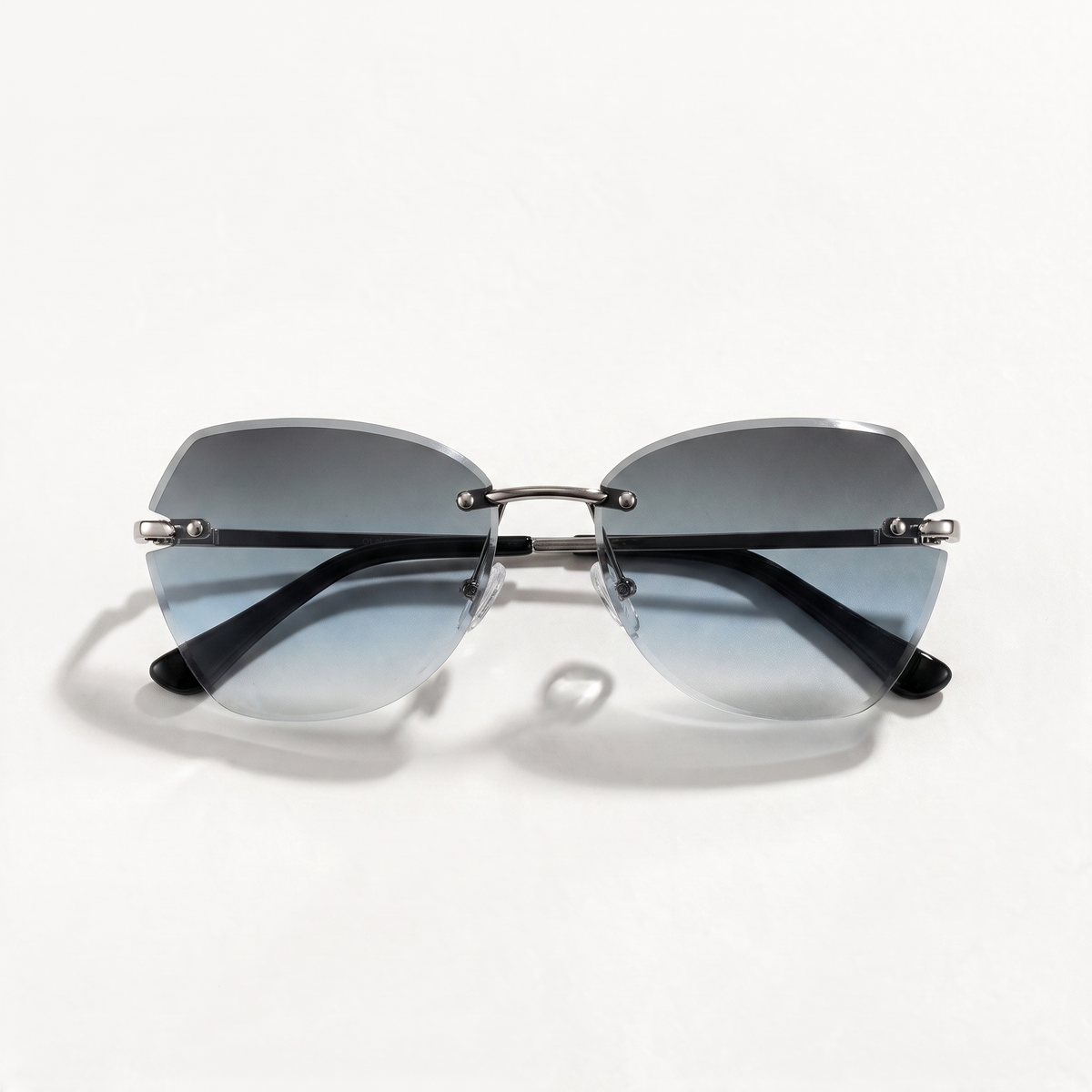 The Blank Tag Lagoon rimless square sunglasses for women, light gun metal with blue-grey gradient lens – detail view — view 4