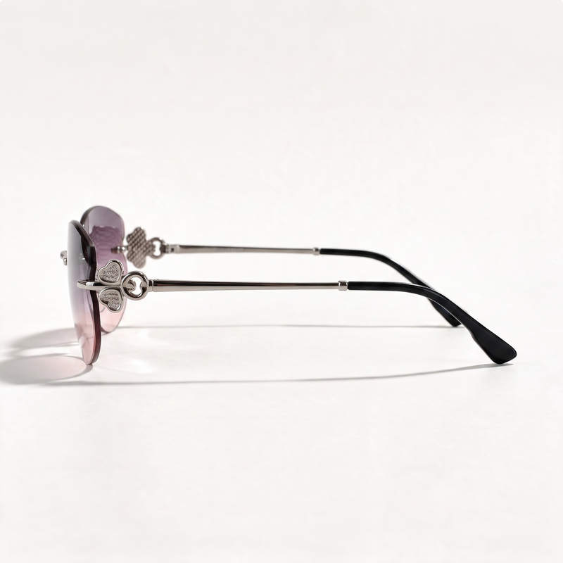 The Blank Tag Mermaid rimless oval sunglasses for women, gun metal with purple-pink gradient lens – side view — view 2