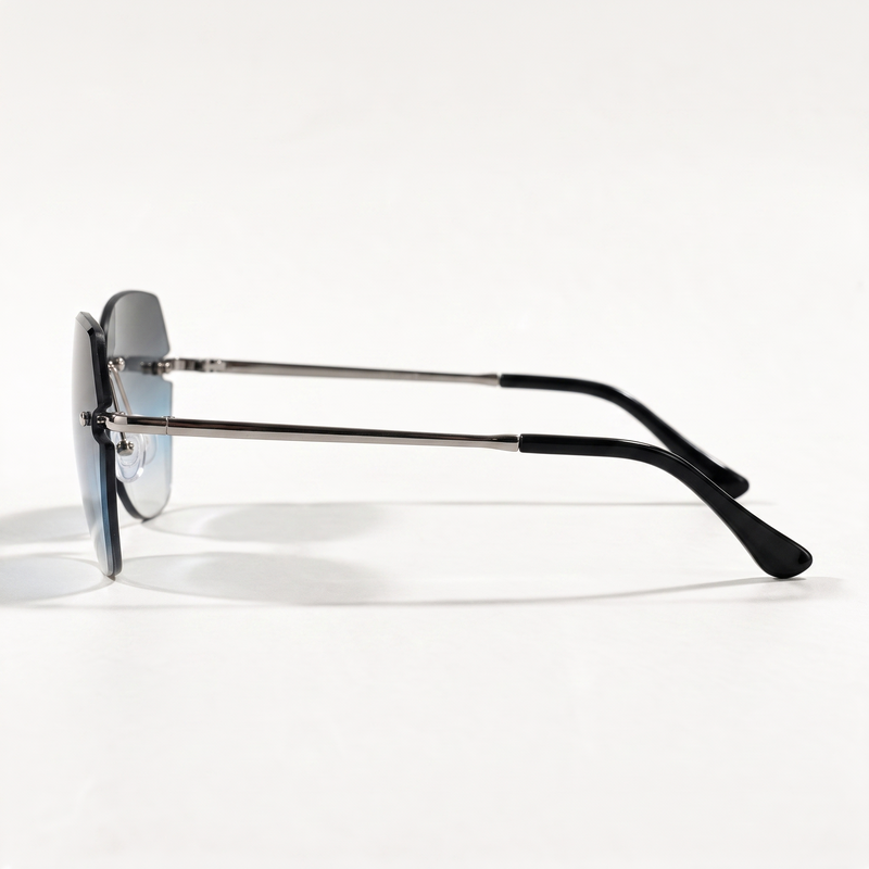 The Blank Tag Lagoon rimless square sunglasses for women, light gun metal with blue-grey gradient lens – angled view — view 3