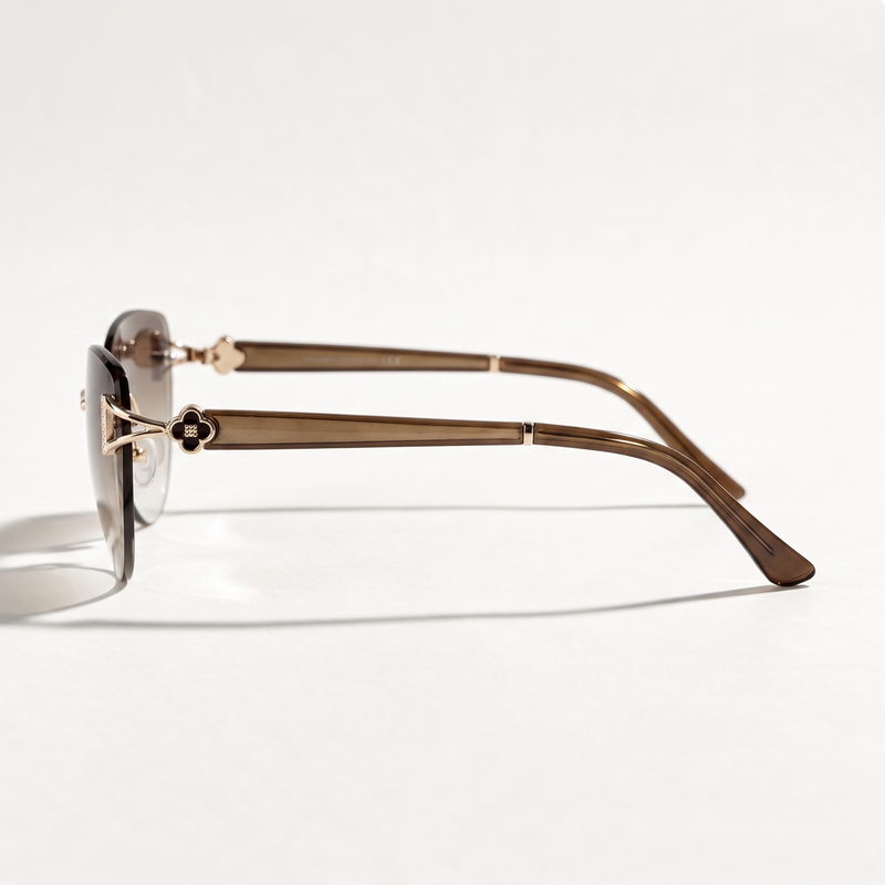 The Blank Tag Marquise oversized rimless cat-eye sunglasses for women, gold with brown gradient lens – side view — view 2