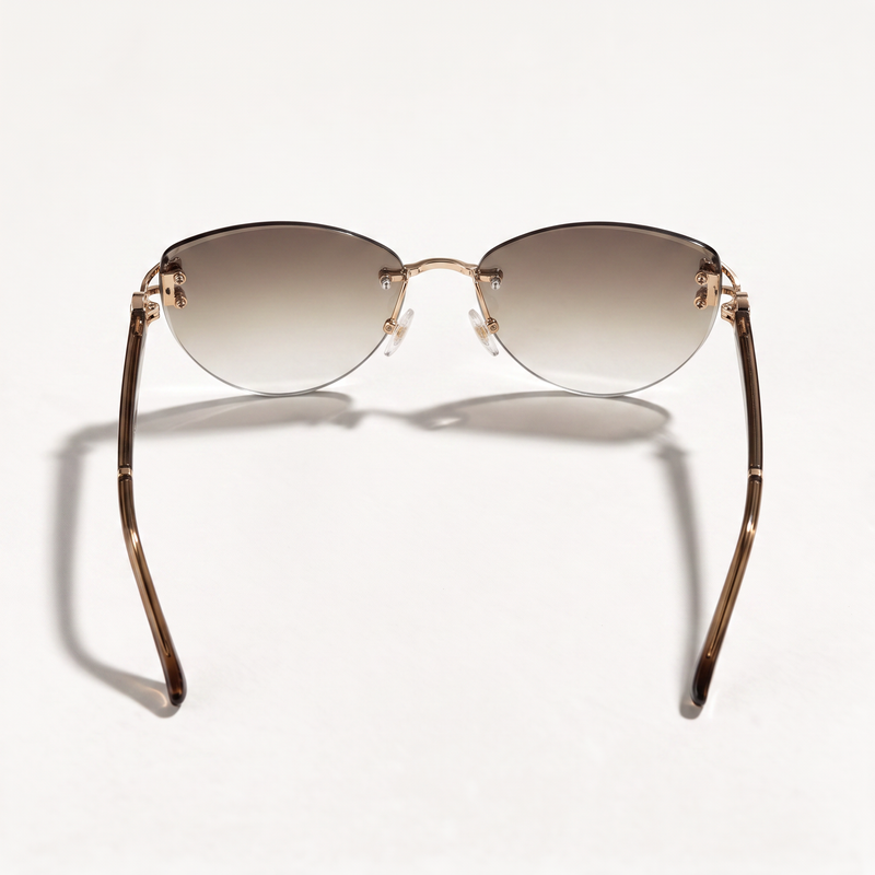 The Blank Tag Marquise oversized rimless cat-eye sunglasses for women, gold with brown gradient lens – angled view — view 3