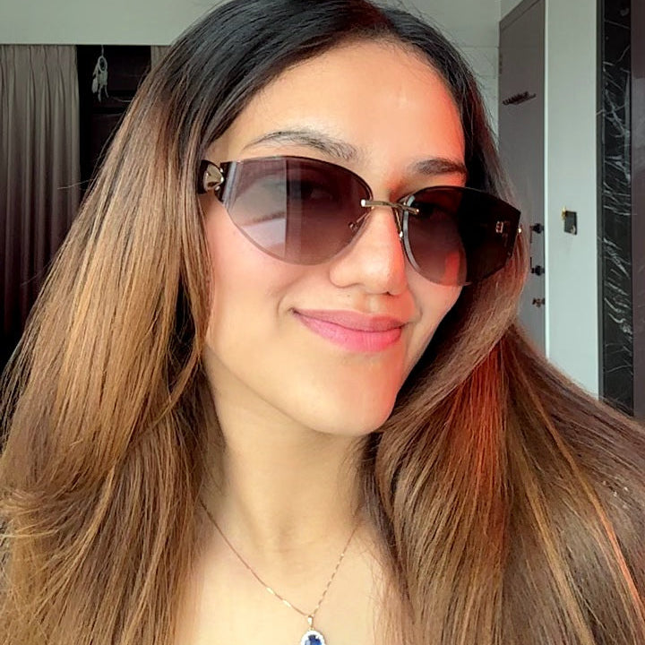 The Blank Tag Countess rimless wrap cat-eye sunglasses, gold with brown gradient — worn on model — view 3
