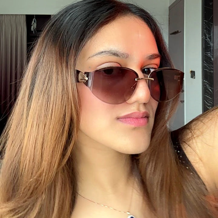 The Blank Tag Countess rimless wrap cat-eye sunglasses — worn on model, second angle — view 4